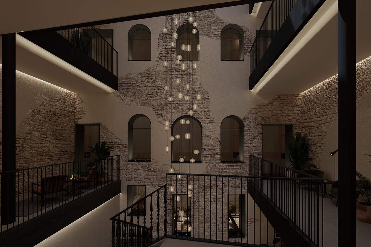 Diseño de interiorismo para pasillos y patio de hotel en barcelona